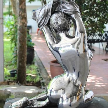 polished stainless steel woman