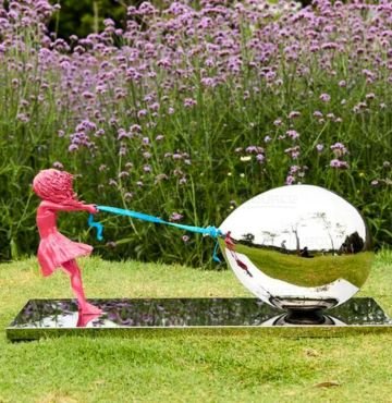 stainless steel balloon and girl