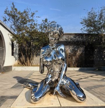 stainless steel sitting woman statue