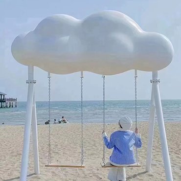 stainless steel swing sculpture